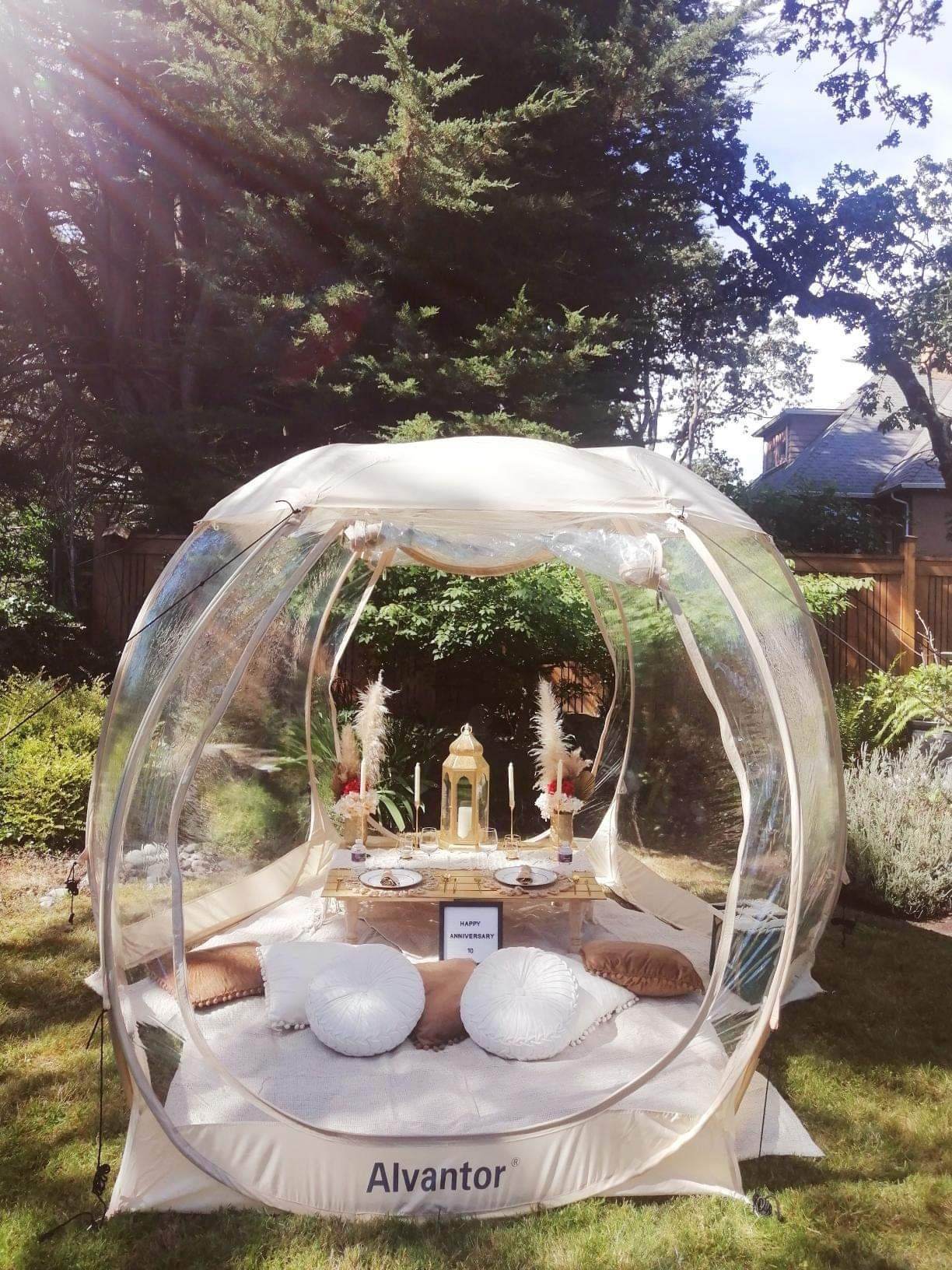 A 10th-anniversary dinner styled inside a clear garden dome
