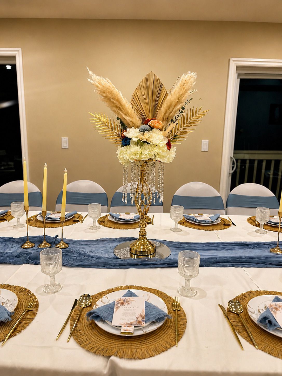 A long banquet table styled for a private dinner